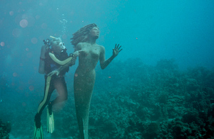 Rick Ciordia touching a mermaid